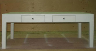 Front view of a white coffee table with two drawers