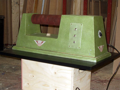 Front view of an old fashioned free-standing sanding machine