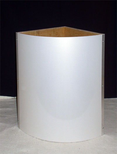 Front view of a curved, white-veneered washing basket