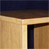 Close-up detail of a wooden bedside table