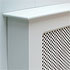 Close-up detail of a white radiator cover